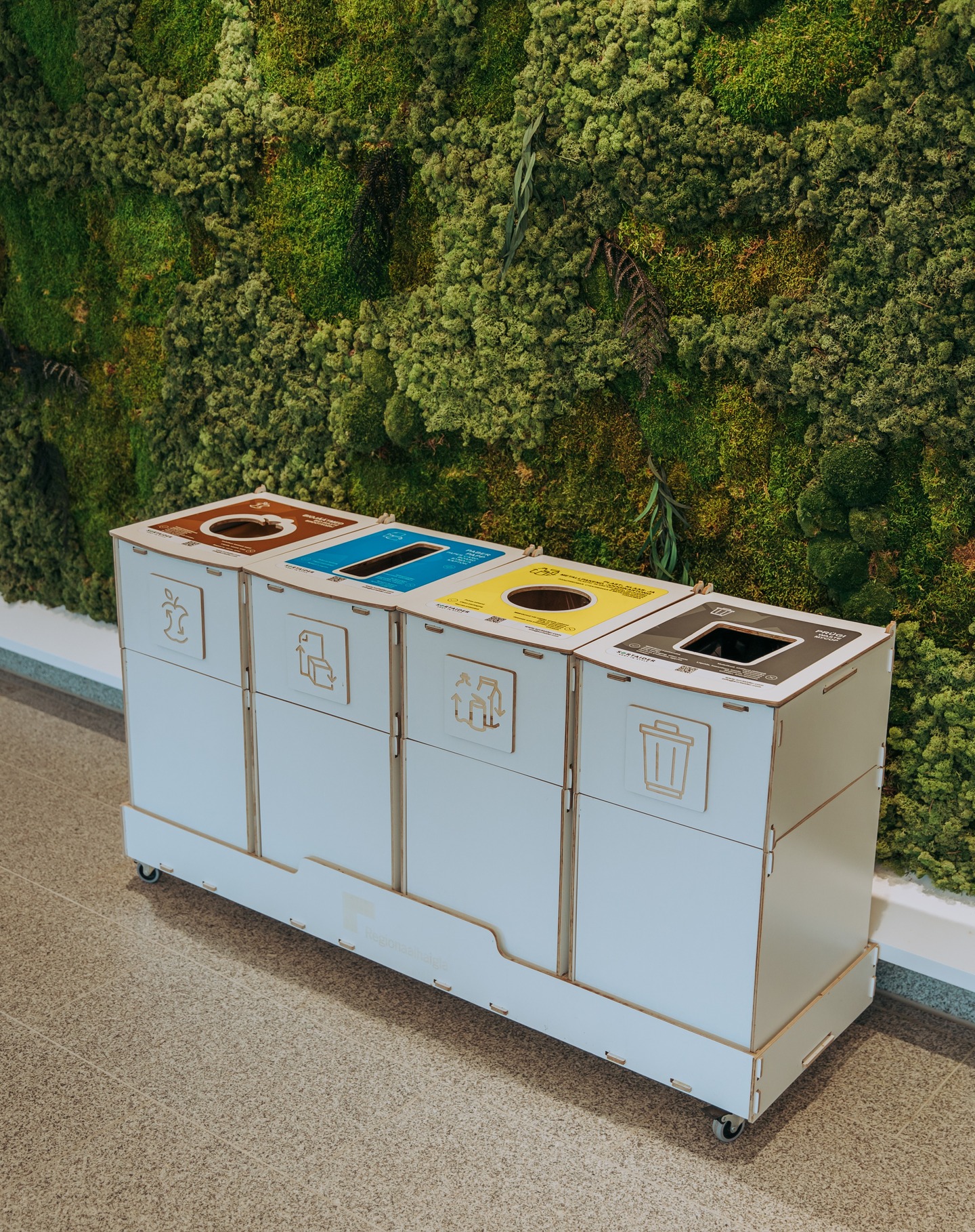 Eco-friendly waste sorting station with color-coded lids for schools, hospitals, and public spaces