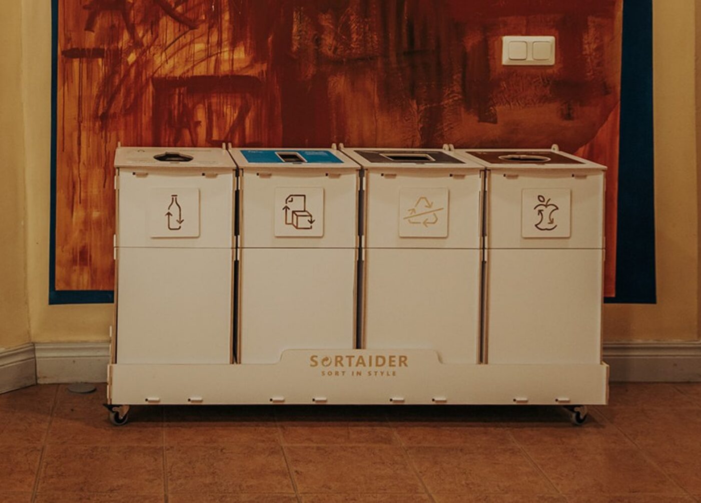 Recycling bins with modern designs used for efficient waste sorting in a modern business environment
