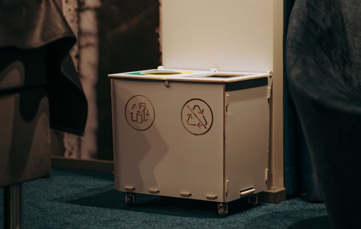 Recycling bins for hotels placed discreetly to support casual waste sorting.