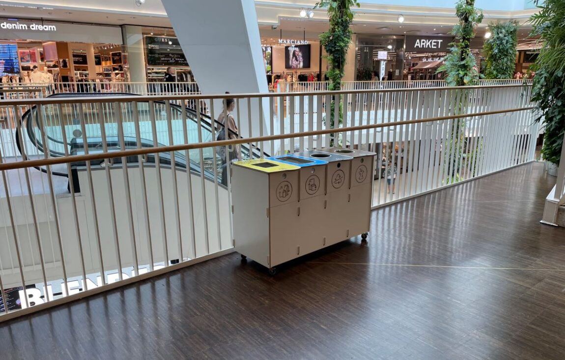 Recycling bins for office entry points placed near entrances to support immediate sorting.