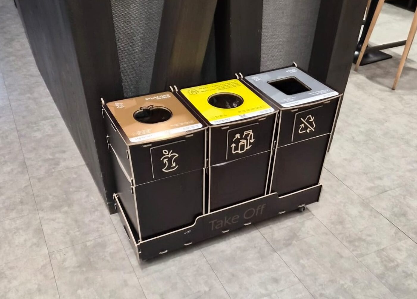 Recycling bins for office kitchen areas placed near counters to support food and packaging sorting.