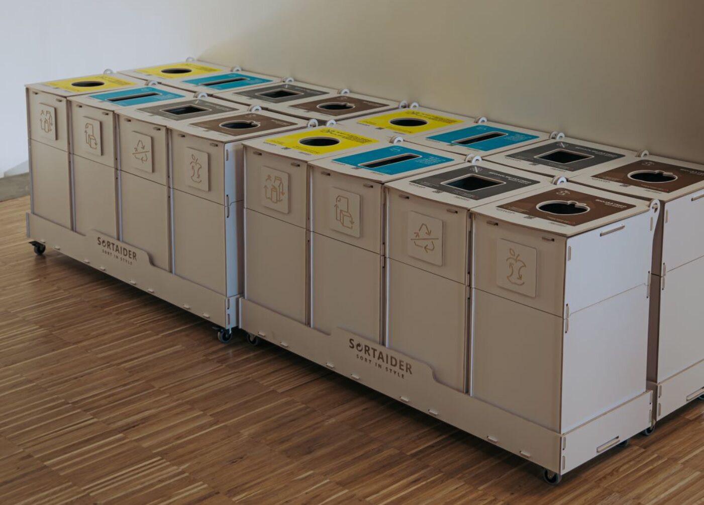 Recycling bins for quiet work areas placed discreetly to support focused work environments.