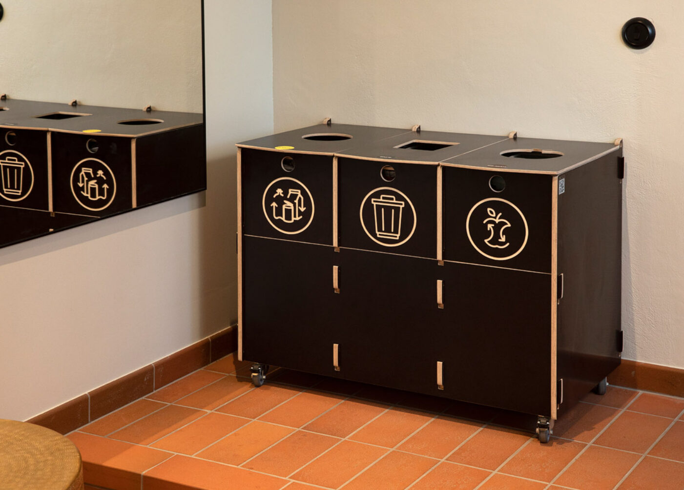 Recycling bins for schools placed in a school corridor to support everyday waste sorting habits.