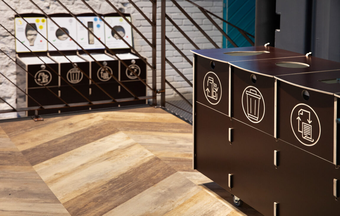 Recycling bins for shared office zones placed in common areas to support consistent recycling.