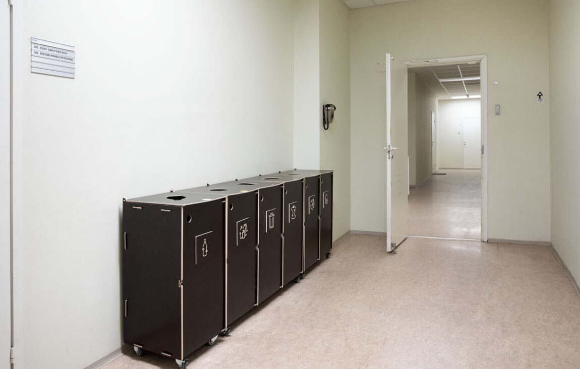 Recycling bins with leak-proof bottoms supporting clean waste sorting.
