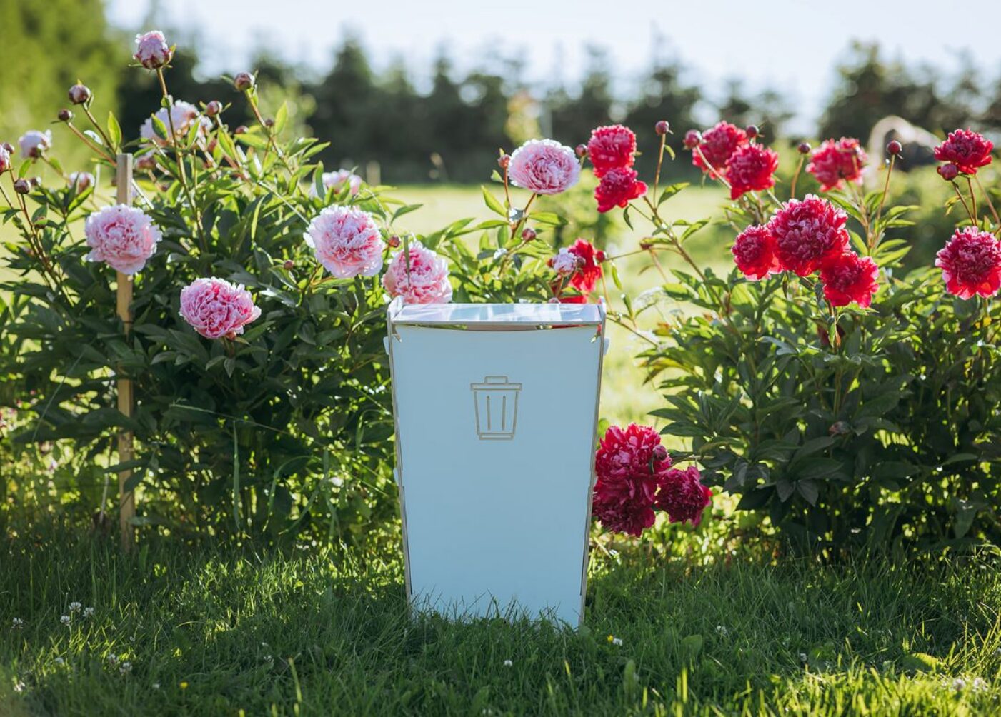 Waste bins placed in a public area to support intuitive waste disposal for passers-by.