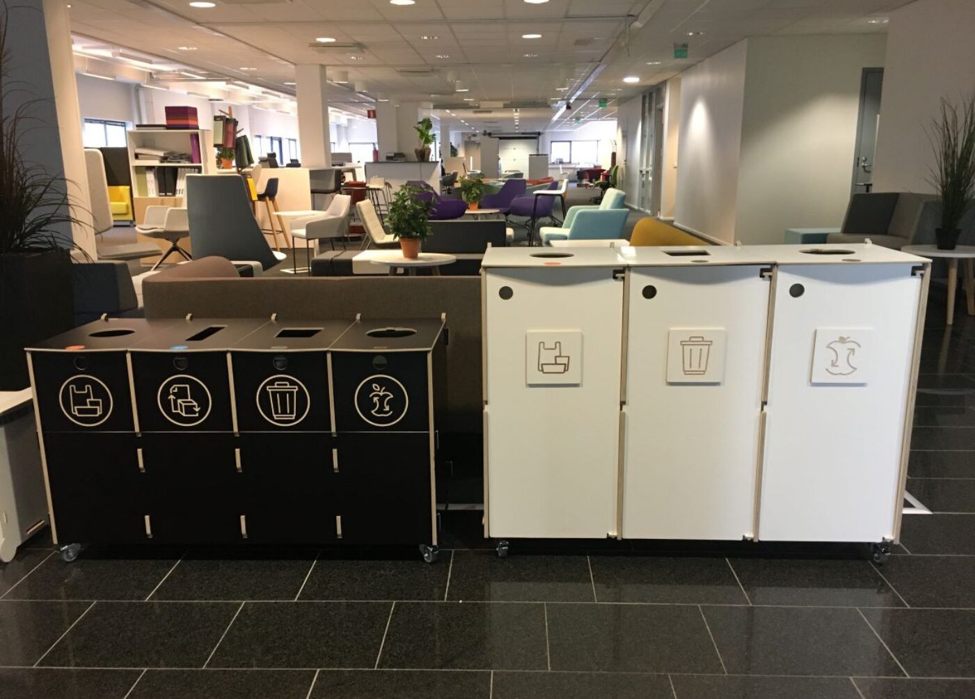 Waste bins for business centres positioned in shared areas to support clear waste sorting.