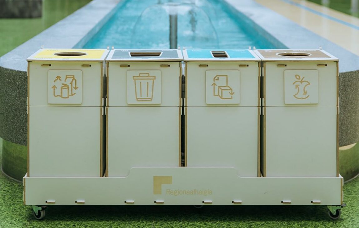 Waste bins for healthcare facilities placed in a formal setting to support discreet waste sorting.