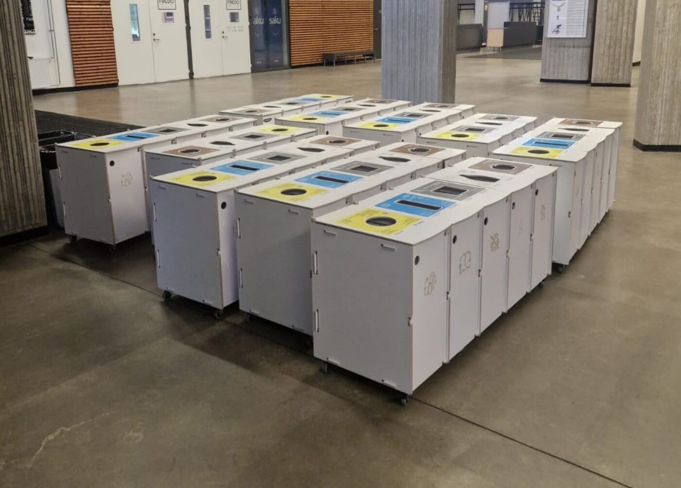 Waste bins for office circulation hubs placed in high-traffic areas to support quick disposal.