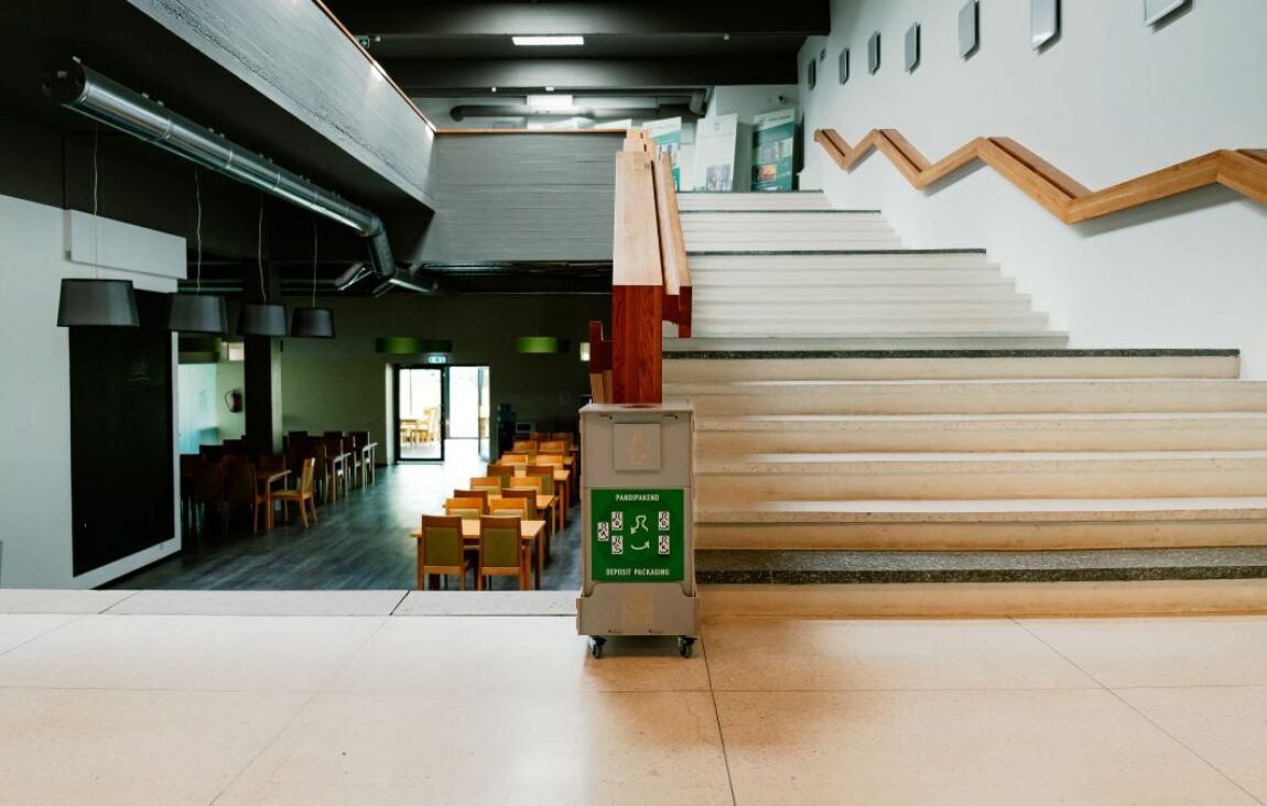Waste collection and sorting at universities include garbage cans used for waste collection and sorting, promoting organized and efficient recycling